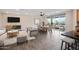 Open living space with a kitchen, dining area and sliding doors that lead to the balcony at 5100 E Rancho Paloma E Dr # 1046, Cave Creek, AZ 85331