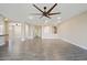 Bright, open living space features recessed lighting, ceiling fan, and wood-look flooring at 5100 E Rancho Paloma E Dr # 1046, Cave Creek, AZ 85331