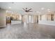Bright living room with an open floor plan featuring wood-look flooring and recessed lighting at 5100 E Rancho Paloma E Dr # 1046, Cave Creek, AZ 85331