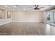 Spacious living room with ceiling fan, recessed lighting, and wood-look tile flooring at 5100 E Rancho Paloma E Dr # 1046, Cave Creek, AZ 85331