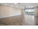 Spacious living room features a sliding door to balcony, tile flooring, and recessed lights at 5100 E Rancho Paloma E Dr # 1046, Cave Creek, AZ 85331