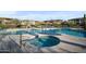 Relaxing community pool and spa area with comfortable seating and desert landscaping at 5100 E Rancho Paloma E Dr # 1046, Cave Creek, AZ 85331