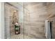 Luxurious walk-in shower with elegant tile work and modern fixtures at 5100 E Rancho Paloma E Dr # 1046, Cave Creek, AZ 85331