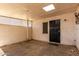 Covered backyard featuring a door to the house at 5254 N 42Nd Pkwy, Phoenix, AZ 85019