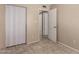 Neutral bedroom with tiled floors and a closet at 5254 N 42Nd Pkwy, Phoenix, AZ 85019