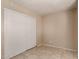 Neutral bedroom with tiled floors and closet at 5254 N 42Nd Pkwy, Phoenix, AZ 85019