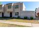 Townhome featuring a secure entry, low-maintenance landscaping, and proximity to a sidewalk at 5254 N 42Nd Pkwy, Phoenix, AZ 85019