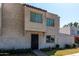 Well-maintained two-story townhome with low-maintenance landscaping and secure front entry at 5254 N 42Nd Pkwy, Phoenix, AZ 85019