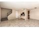 Open living space with tile flooring, stairs and natural light, perfect for relaxing and entertaining at 5254 N 42Nd Pkwy, Phoenix, AZ 85019