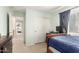 Well-lit bedroom with sliding closet and window for plenty of natural light at 5749 S 249Th Dr, Buckeye, AZ 85326