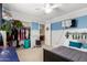 Bedroom with ample closet space, modern decor, and ceiling fan at 5749 S 249Th Dr, Buckeye, AZ 85326