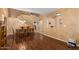 Dining area showcasing hardwood floors and access to the staircase and other rooms at 5749 S 249Th Dr, Buckeye, AZ 85326