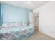 Neutral-toned bedroom featuring carpet, a ceiling fan and an open doorway at 581 W Angus Rd, San Tan Valley, AZ 85143