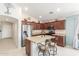 Well-appointed kitchen with a central island, stainless steel appliances, and ample storage at 581 W Angus Rd, San Tan Valley, AZ 85143
