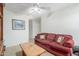 Relaxing living room with plush sofa, wood table and bright white walls at 581 W Angus Rd, San Tan Valley, AZ 85143