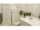 Bathroom showcasing a shower with glass doors and a modern sink with stylish faucet at 5854 S Del Rancho --, Mesa, AZ 85212