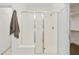 Bright bathroom featuring a shower with glass doors and a convenient built-in bench at 5854 S Del Rancho --, Mesa, AZ 85212