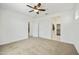 Carpeted bedroom is ready to make your own, offering en-suite bathroom and walk-in closet at 5854 S Del Rancho --, Mesa, AZ 85212