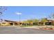 Community welcome center with modern architecture and ample parking at 5854 S Del Rancho --, Mesa, AZ 85212