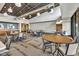 Inviting community room with tables, chairs, and a neutral color palette at 5854 S Del Rancho --, Mesa, AZ 85212