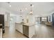 Open concept kitchen featuring a large island and easy access to the living area at 5854 S Del Rancho --, Mesa, AZ 85212