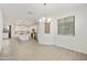 Bright, open-concept layout with tiled floor connecting the kitchen and living areas at 5854 S Del Rancho --, Mesa, AZ 85212