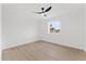 A modern bedroom features light wood floors and a bright window view at 6134 E Hannibal St, Mesa, AZ 85205