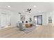 Living room with modern furniture, view of backyard, and natural light at 6134 E Hannibal St, Mesa, AZ 85205
