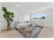 Inviting living room with a cozy seating area, decorative rug, and natural light at 6134 E Hannibal St, Mesa, AZ 85205