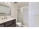 Modern bathroom features a sleek vanity, updated fixtures, and a glass-enclosed shower for a spa-like experience at 7960 E Camelback Rd # 209, Scottsdale, AZ 85251