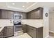Well-equipped kitchen showcasing stainless steel appliances and ample counter space for food preparation at 7960 E Camelback Rd # 209, Scottsdale, AZ 85251