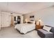 Spacious main bedroom offers a relaxing atmosphere with a queen bed, and ample closet space at 7960 E Camelback Rd # 209, Scottsdale, AZ 85251
