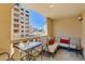 Cozy outdoor patio with comfortable seating and views of the building at 7960 E Camelback Rd # 209, Scottsdale, AZ 85251