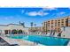 Inviting outdoor pool with lounge chairs and palm trees at 7960 E Camelback Rd # 209, Scottsdale, AZ 85251