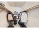 Organized walk-in closet with ample storage space for clothing, shoes, and accessories at 7960 E Camelback Rd # 209, Scottsdale, AZ 85251