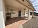 Covered back patio with tile flooring offering a comfortable outdoor space at 8217 E Medina Ave, Mesa, AZ 85209