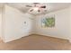 Spacious bedroom features a large window for natural light and a wide closet for ample storage at 9009 S 57Th Dr, Laveen, AZ 85339