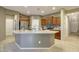 Stylish kitchen with stainless steel appliances, granite countertops, and ample cabinet space at 9009 S 57Th Dr, Laveen, AZ 85339