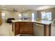 Modern kitchen featuring a spacious island, stainless steel appliances, and an open layout at 9009 S 57Th Dr, Laveen, AZ 85339