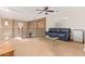 Loft with a couch, minibar, and a glass coffee table perfect for a relaxing space at 9009 S 57Th Dr, Laveen, AZ 85339