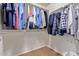 Walk-in closet containing clothing racks and carpet flooring at 9009 S 57Th Dr, Laveen, AZ 85339