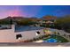 Luxury backyard with pool, putting green, and mountain views; perfect for relaxation and entertainment at 9735 E Kemper Way, Scottsdale, AZ 85255