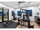 Spacious exercise room with modern equipment, ceiling fan, and natural light, perfect for a home gym at 9735 E Kemper Way, Scottsdale, AZ 85255