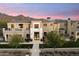 Stunning exterior of the house with mountain views in the background at 9735 E Kemper Way, Scottsdale, AZ 85255