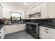 Spacious laundry room with modern appliances and ample storage space at 9735 E Kemper Way, Scottsdale, AZ 85255