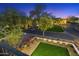 Scenic neighborhood with lush landscaping, mature trees, and well-maintained sidewalks, creating a serene environment at 9735 E Kemper Way, Scottsdale, AZ 85255