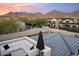 Rooftop patio view, ideal for outdoor relaxation with comfortable seating and mountain views at 9735 E Kemper Way, Scottsdale, AZ 85255