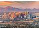 Scenic cityscape view with a stunning mountain backdrop at sunset, showcasing urban charm at 101 N 7Th St # 210, Phoenix, AZ 85034