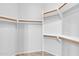 Walk-in closet with shelves and racks at 101 N 7Th St # 210, Phoenix, AZ 85034