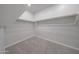 Bright, walk-in closet with carpeted floor and white walls at 18207 W Daley Ln, Surprise, AZ 85387